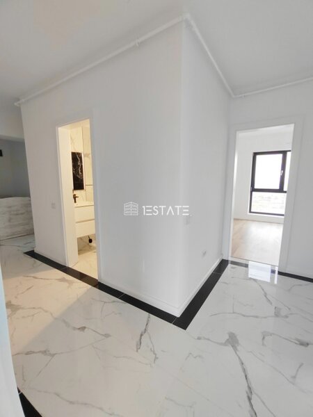 Titan finalizat  3 cam. 79mp +terasa 34 mp, etaj 9/11,  loc parcare inclus