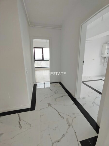 Titan finalizat  3 cam. 79mp +terasa 34 mp, etaj 9/11,  loc parcare inclus